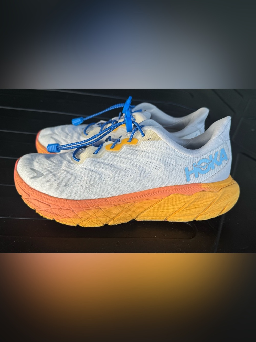 Hoka White Sneakers with Blue, Yellow and Orange Accents